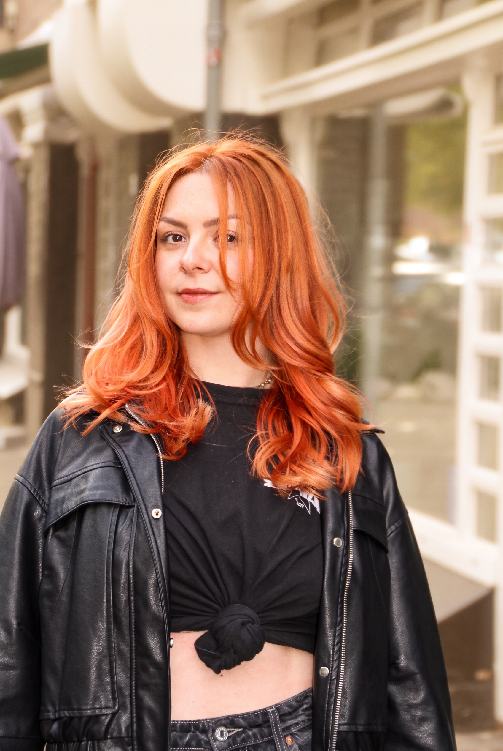Client with a layered mid length cut styled at Icon Hair Salon Amsterdam Zuid