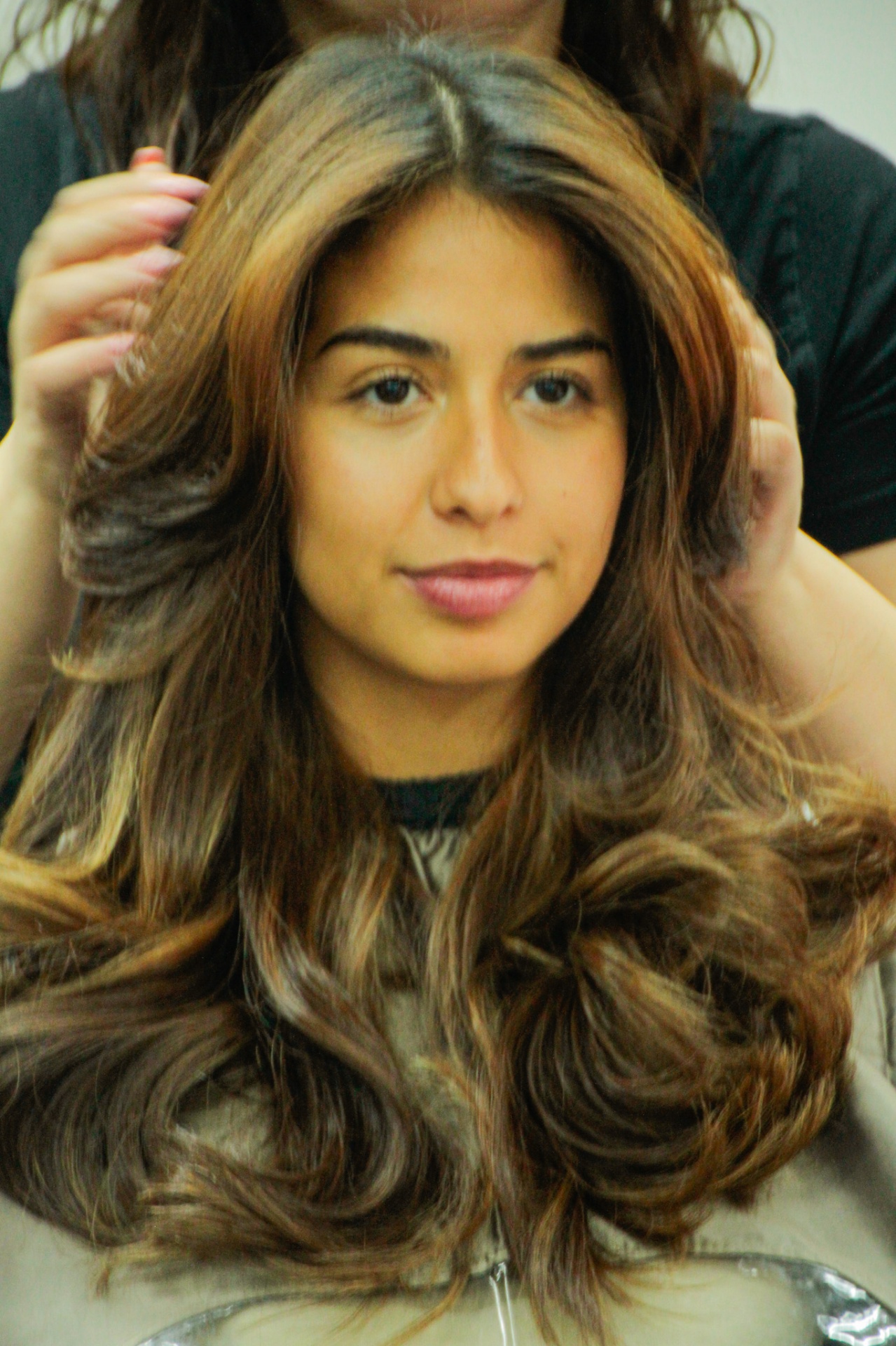 Long layered blow-dry finish on a client at Icon Hair Salon Amsterdam Zuid